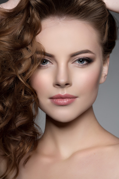Model with long hair. Waves Curls Hairstyle. Hair Salon. Updo. F - Photo, Image