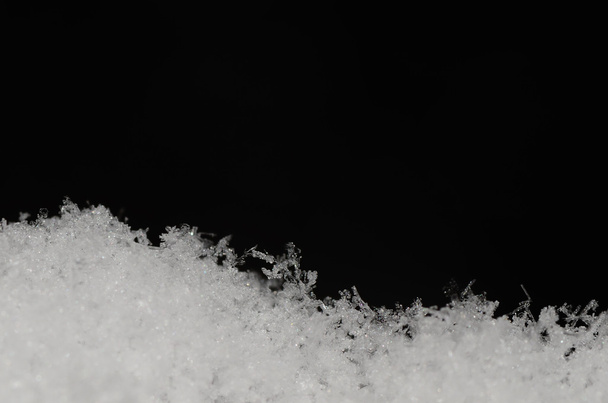 herkkä löysä lumi mustalla
 - Valokuva, kuva