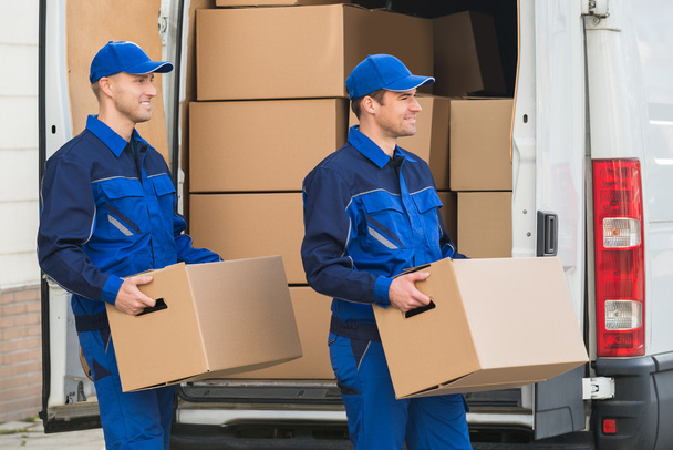 Delivery Men Carrying Cardboard Boxes - Zdjęcie, obraz