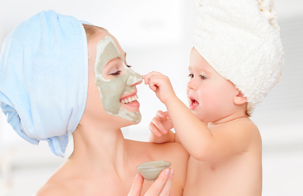 family beauty treatment in  bathroom. mother and daughter baby g - Photo, Image