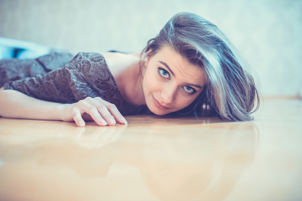 seductive woman lying on the floor - Photo, Image