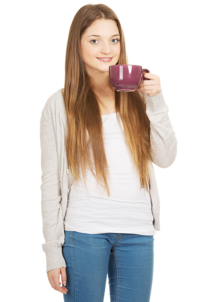 Teen woman with a cup of tea. - Fotografie, Obrázek