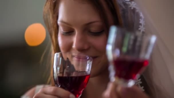 bride is sipping red wine - Πλάνα, βίντεο