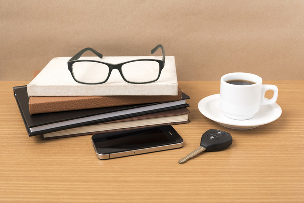 coffee,phone,car key,eyeglasses and stack of book - Foto, Bild