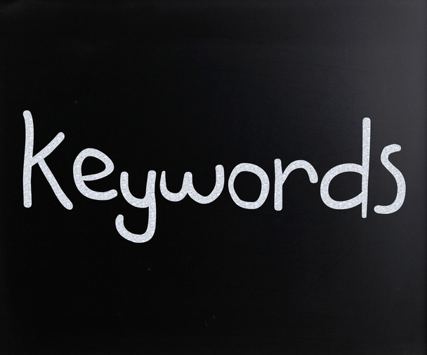 The word "Keywords" handwritten with white chalk on a blackboard - Photo, Image