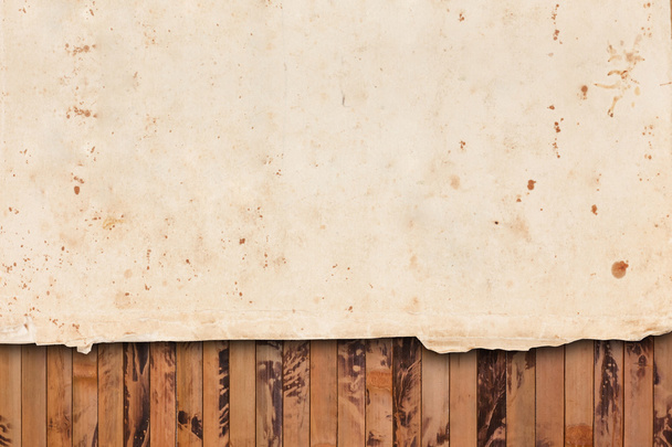 Weathered paper sheet on a wooden background - Zdjęcie, obraz