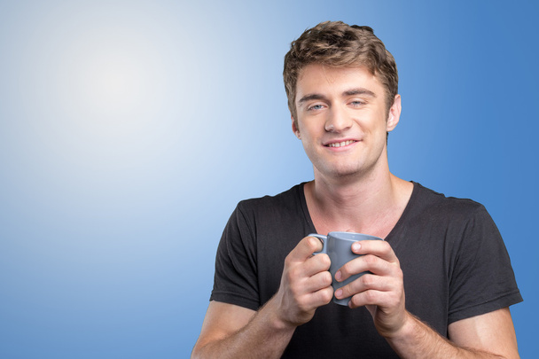 ember, aki meleg csésze tea/kávéfőző - Fotó, kép