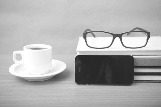 coffee,phone,stack of book and eyeglasses - Photo, image