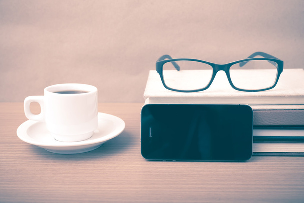 coffee,phone,stack of book and eyeglasses - Foto, Imagem