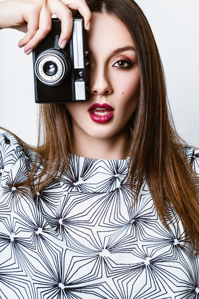 Studio photo of young  woman on white background. - Foto, Bild