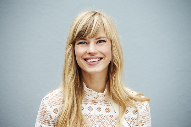 Smiling young blond lady - Photo, image