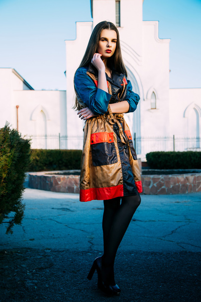 Young woman standing outdoors. fashion portrait.  - Fotografie, Obrázek