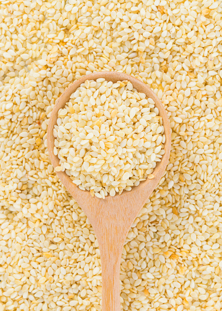 sesame seeds with wooden spoon - Photo, Image