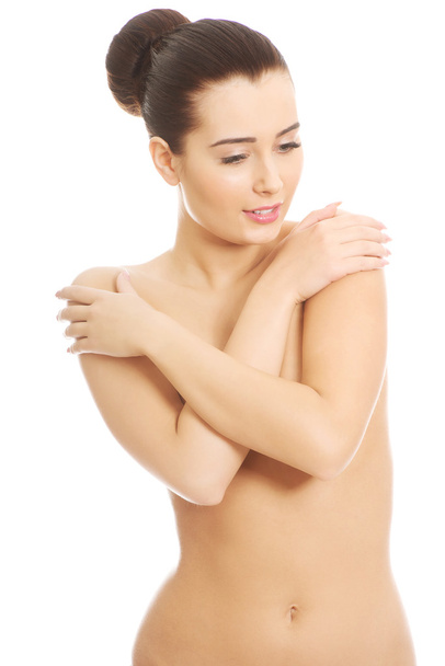 Slim woman covering her breast. - Fotó, kép