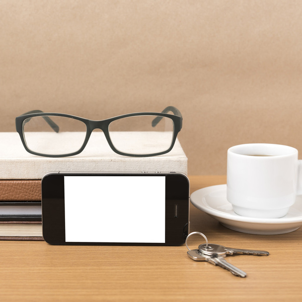 coffee,phone,key,eyeglasses and stack of book - Foto, Imagem