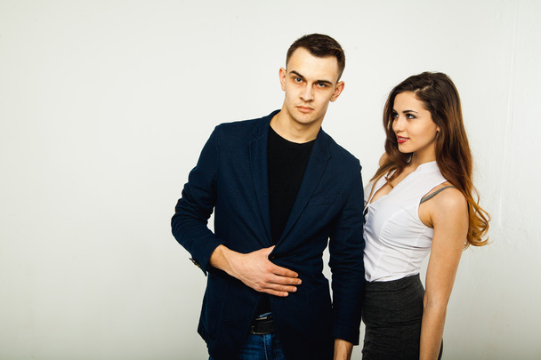 Beautiful young couple in casual clothing - 写真・画像