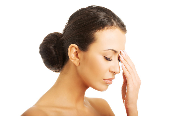 Mujer estresada con los ojos cerrados
 - Foto, imagen