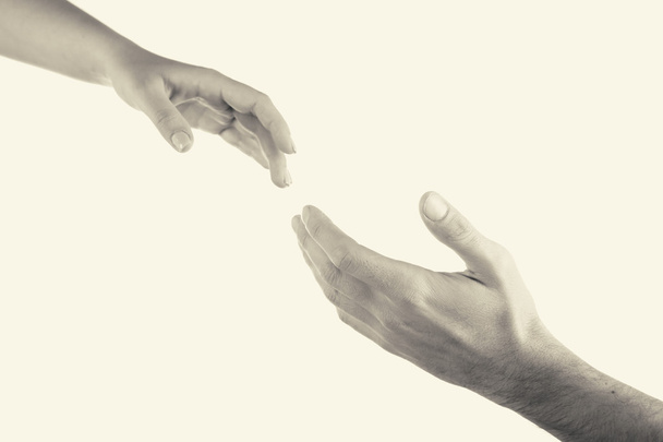Hands reaching toward each other - Foto, imagen