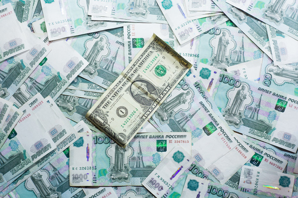 Dollar bill is on the Russian currency - Zdjęcie, obraz