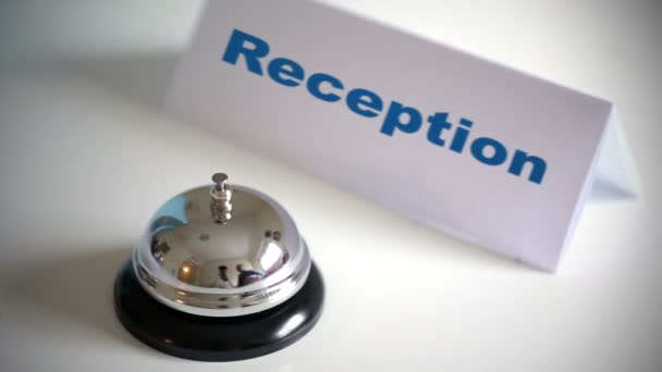 Reception call bell on desk - Materiał filmowy, wideo