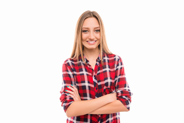Cheerful young pretty girl with crossed hands - Foto, Bild