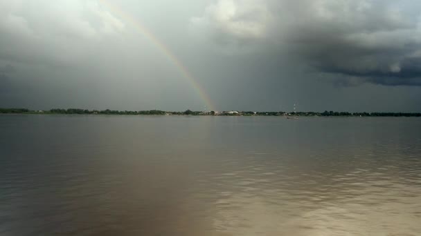 rainbow over the river ( shot from a boat) - Záběry, video