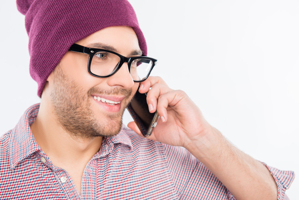 Close up portrait of handsome happy man with hat and glasses tal - 写真・画像