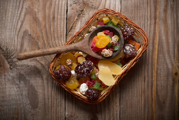 dried fruits mix on wooden background - 写真・画像
