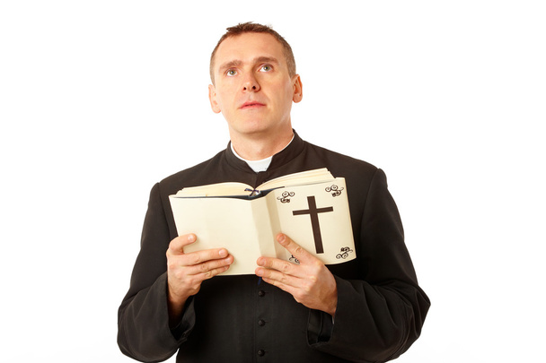 Молодой священник с библией
 - Фото, изображение
