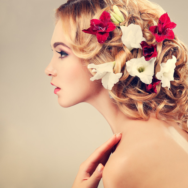 Beautiful  girl with varicoloured flowers - Fotoğraf, Görsel