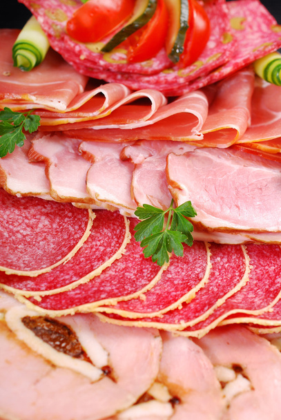 platter of sliced ham,salami and cured meat - Fotó, kép