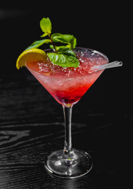 red Cocktail with lemon and mint  - Photo, image
