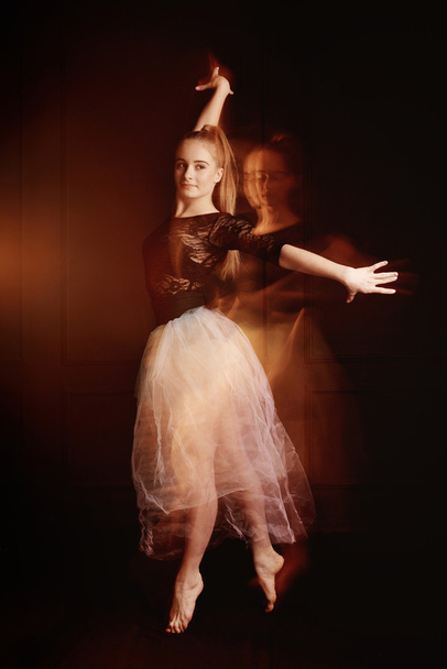 young beautiful dancer girl dancing and jumping, studio - Zdjęcie, obraz