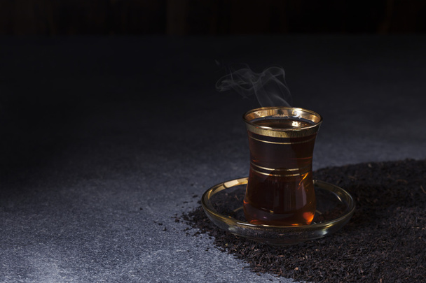 Turkish tea on dark background - Foto, afbeelding