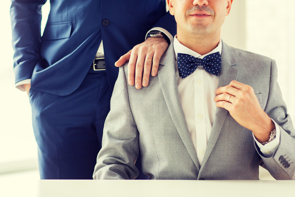 close up of male gay couple with wedding rings on - Fotoğraf, Görsel
