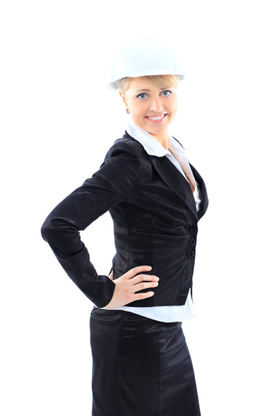 Businesswoman with construction helmet. Isolated on white - Foto, afbeelding