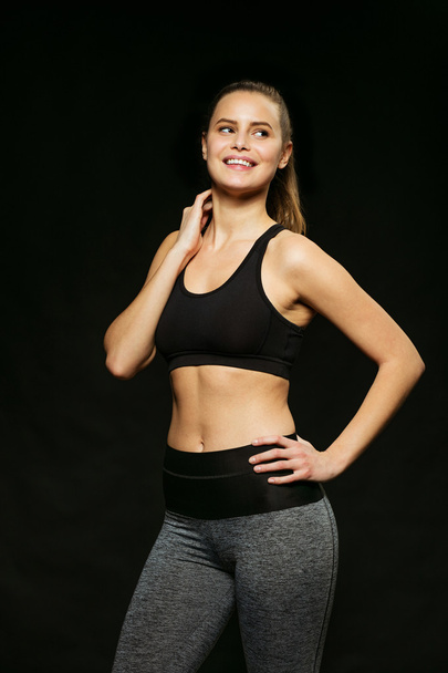 athletic woman doing sport, lifting weights - Fotó, kép