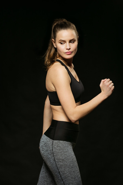 athletic woman doing sport, lifting weights - Valokuva, kuva