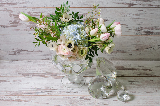 Ranunculus and the anemones in vase of glass. - Photo, Image