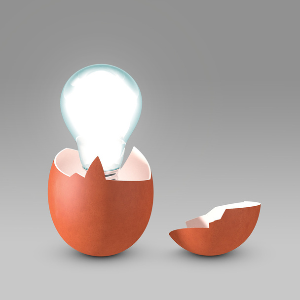 Conceptual picture of nascent idea. Light bulb emerging from eggshell - Photo, Image