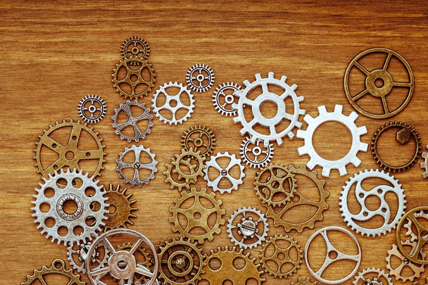 vintage gear wheels on wooden background - Photo, Image