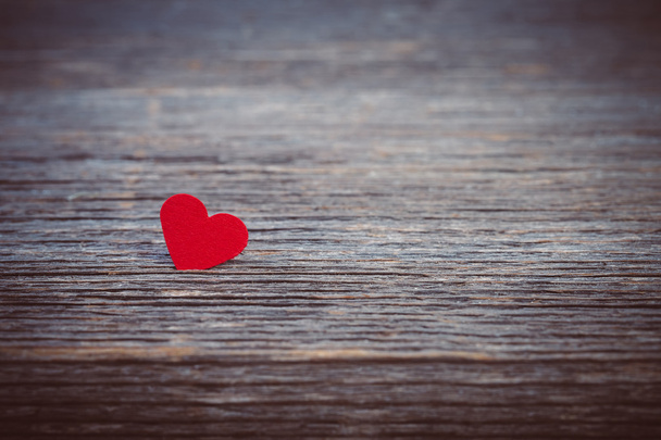 Red heart on old wooden background - Photo, Image