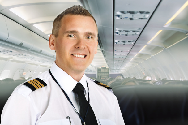 piloto da companhia aérea a bordo
 - Foto, Imagem