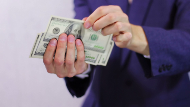 Businessman Counts Money in Hands. - Footage, Video