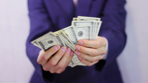 Businessman Counts Money in Hands. - Footage, Video