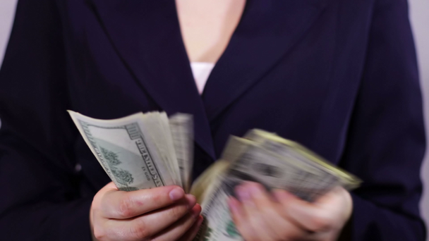 Businesswomen Counts Money in Hands. - Filmati, video