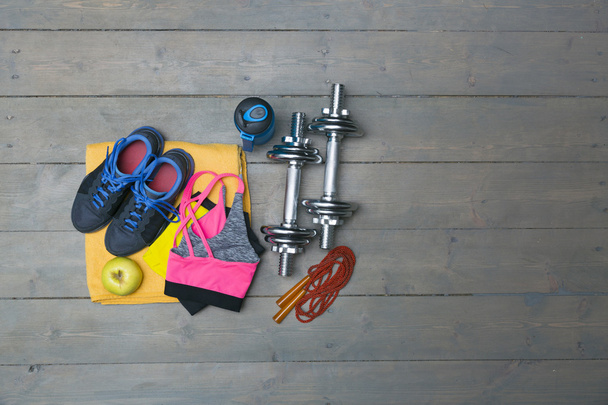 fitness equipment with copy space on gray wooden plank floor - Photo, Image
