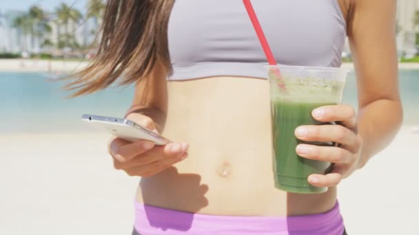 fitness woman drinking vegetable smoothie - Video