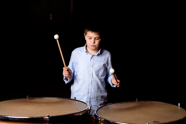 Little drummer with drumsticks - Фото, зображення
