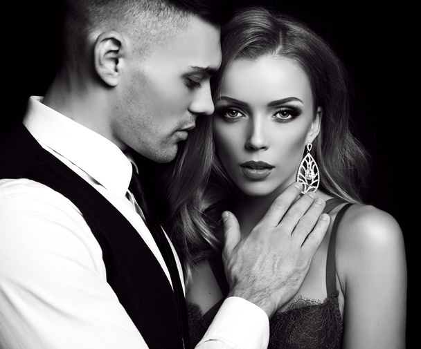 love story. beatiful sexy couple. gorgeous blond woman and handsome man  - Фото, изображение